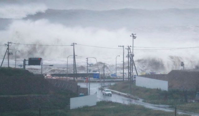 high-waves-triggered-by-typhoon-lionrock-crash-on-a-coast-of-the-city-of-ishinomaki-miyagi-prefecture-japan_5660233